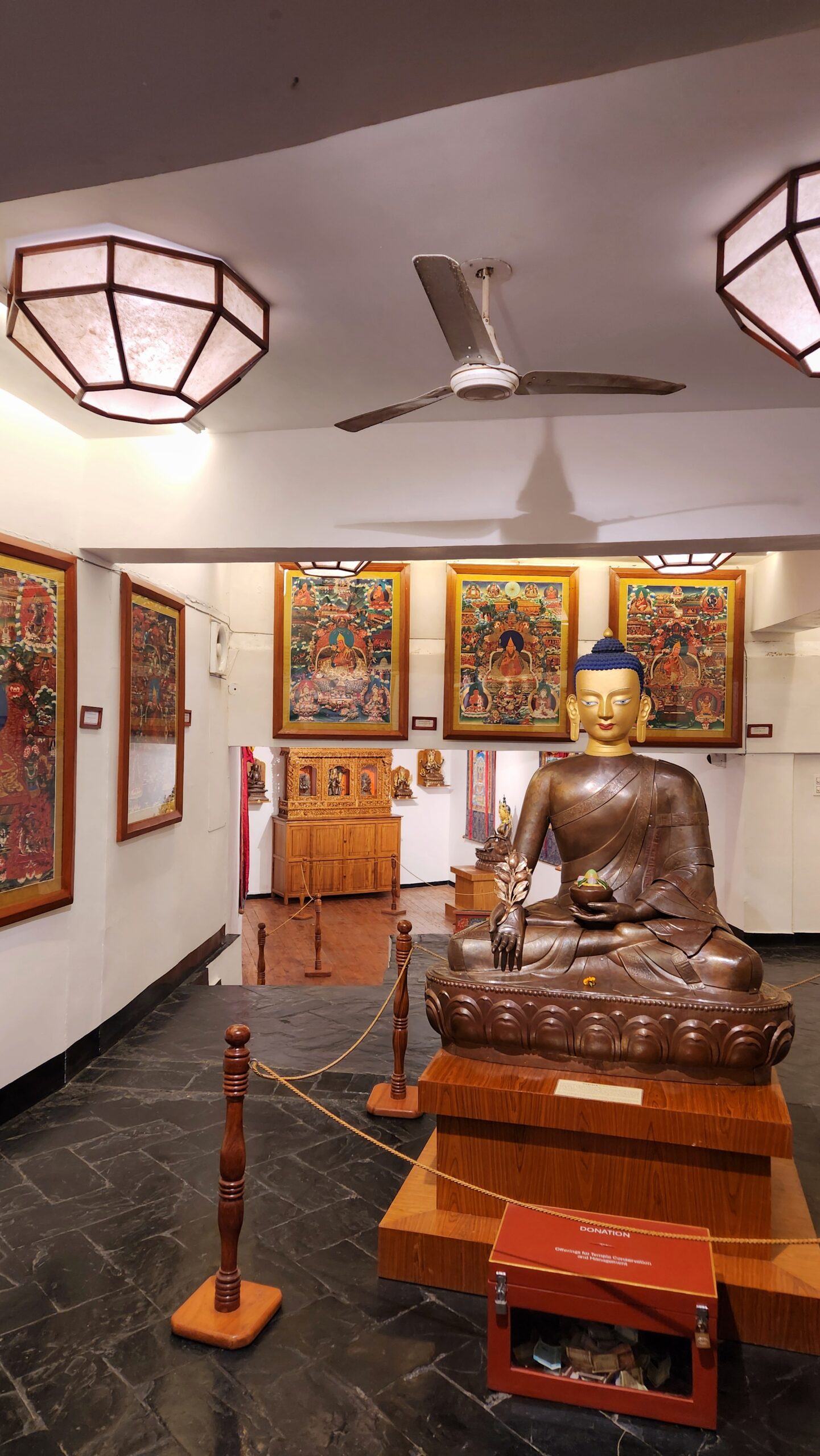 Buddha statue displayed inside the Norbulingka Monastery Museum in Dharamshala