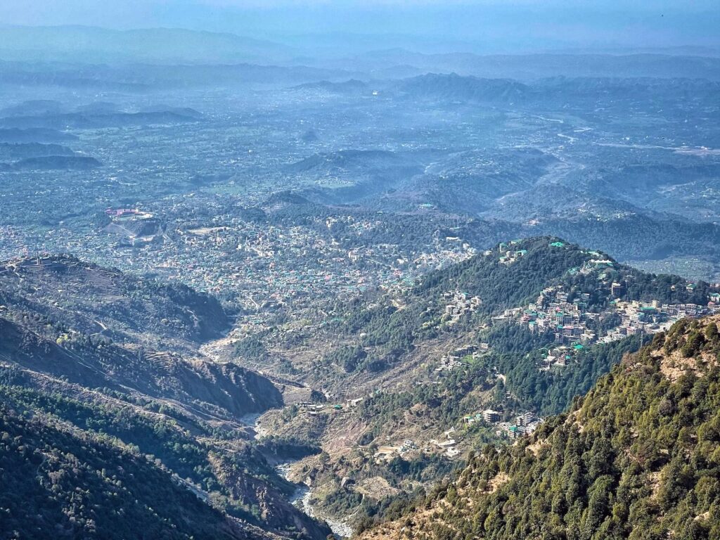 Aerial view of Dharamshala town and Kangra Valley showing the spread-out hills and elevations helpful for planning a Dharamshala itinerary