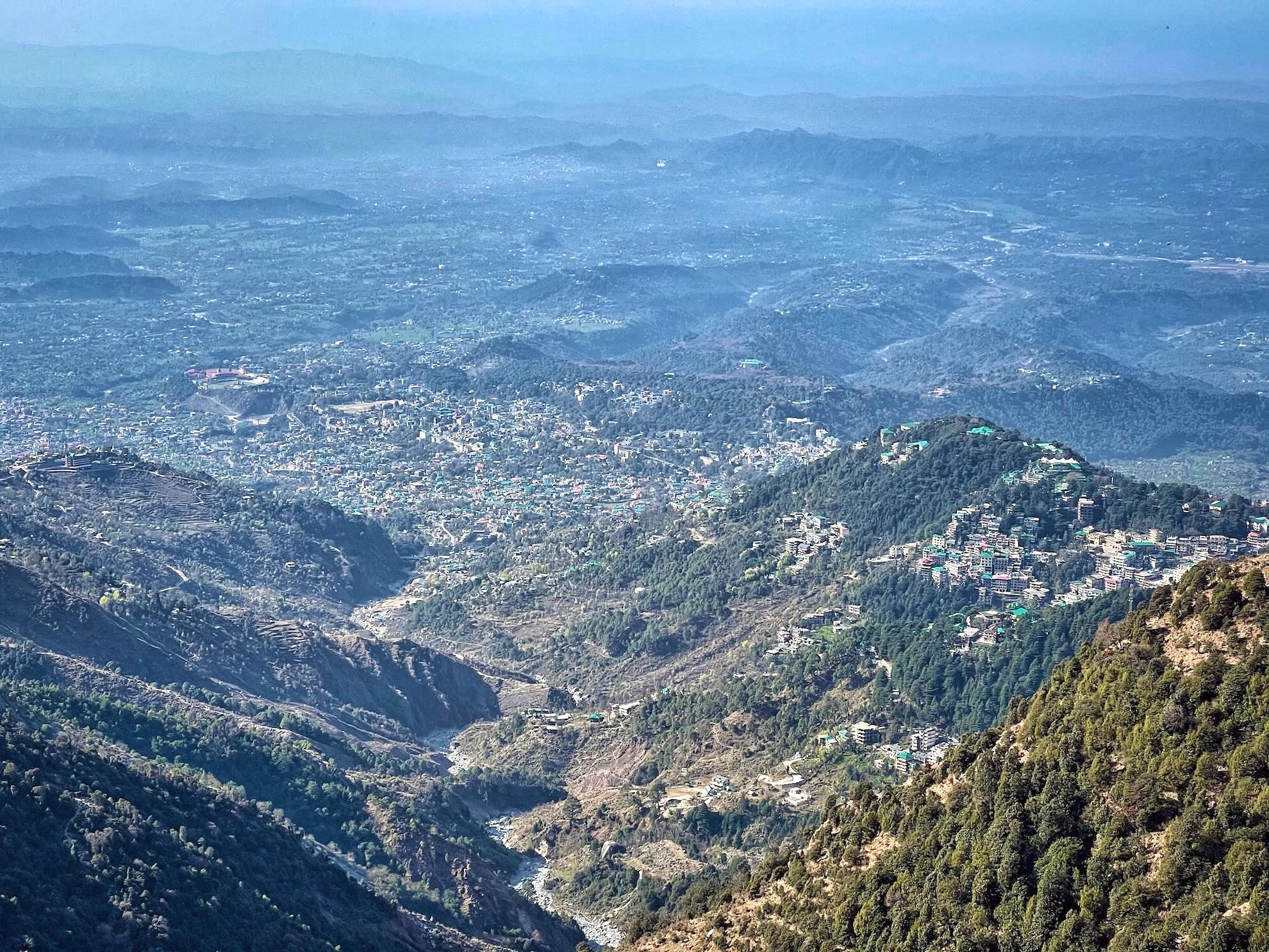 Aerial view of Dharamshala town and Kangra Valley showing the spread-out hills and elevations helpful for planning a Dharamshala itinerary