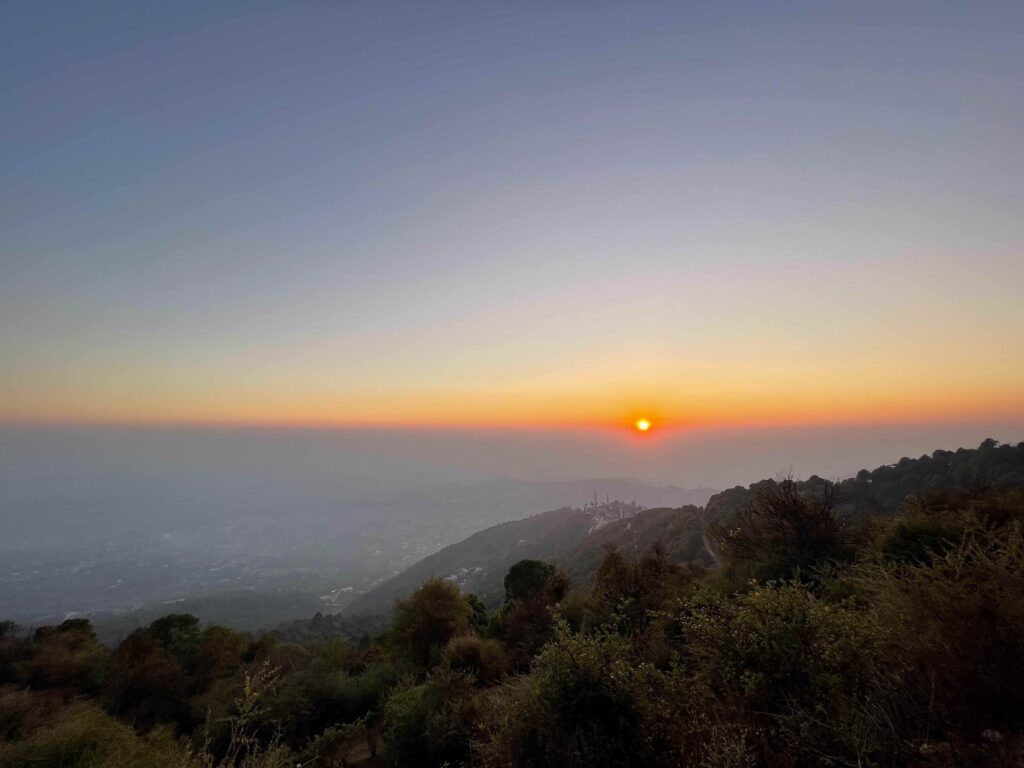 Sunset view over Dharamshala hills during an evening walk, reflecting the lifestyle supported by internet and power in Dharamshala for remote workers