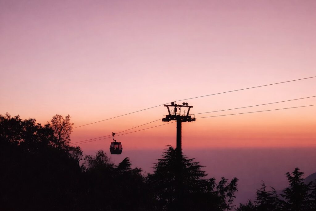 Dharamshala ropeway cable car at sunset showing scenic mountain views and local travel experience in Dharamshala