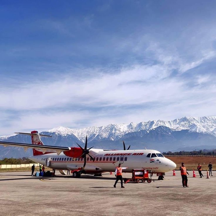 Flight landing at Gaggal Airport Dharamshala with Dhauladhar mountains in background showing how to reach Dharamshala by air