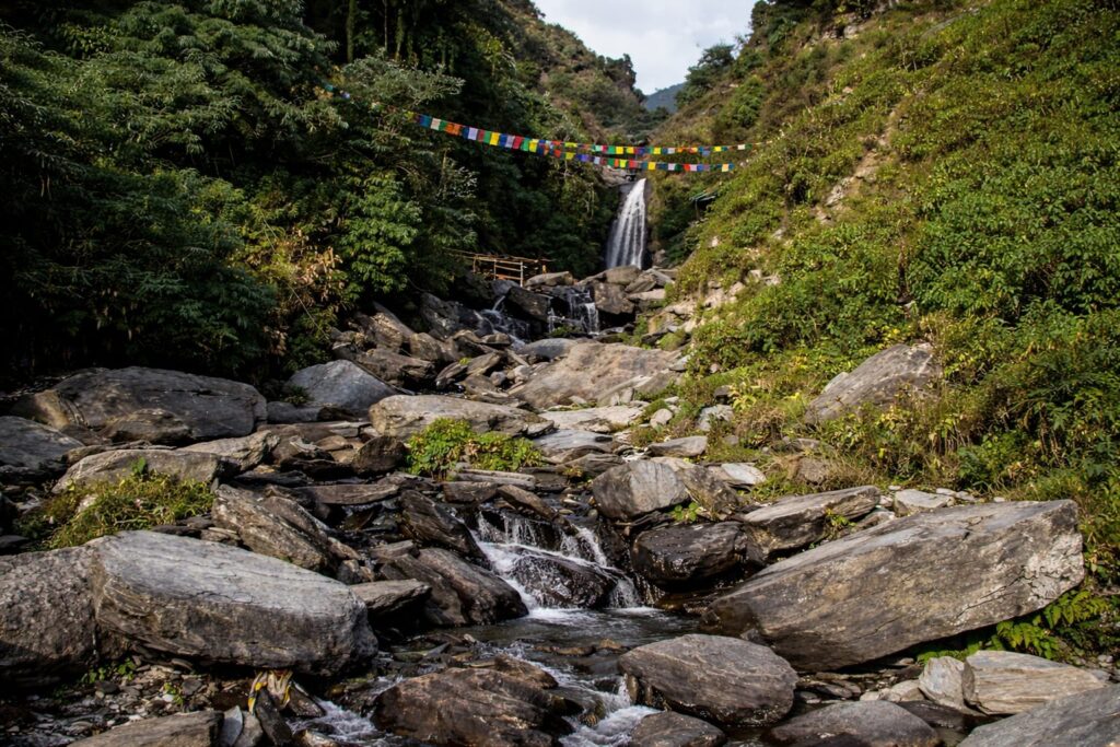 solo female traveller Bhagsu waterfall Dharamshala trekking stream