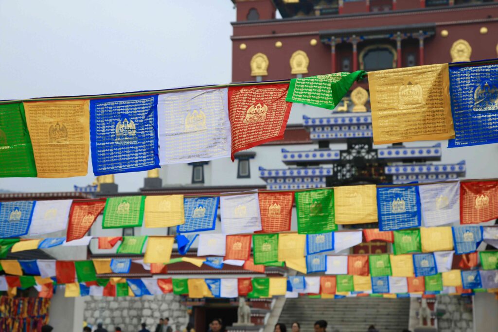 solo female traveller Dharamshala monastery prayer flags Tibetan culture