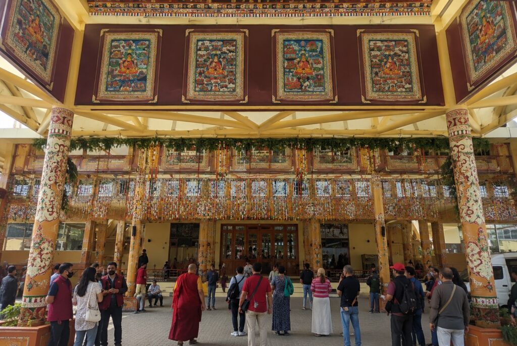 Visitors outside Tsuglagkhang temple during the Dalai Lama 91st birthday in McLeodganj