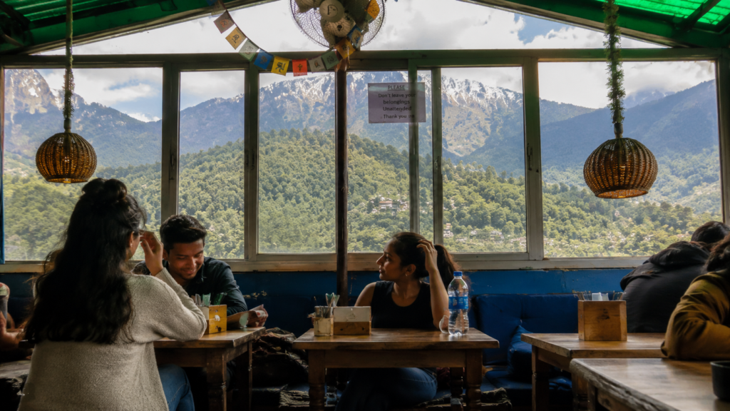 India vs Afghanistan Dharamshala cricket weekend cafe atmosphere with mountain views in McLeod Ganj