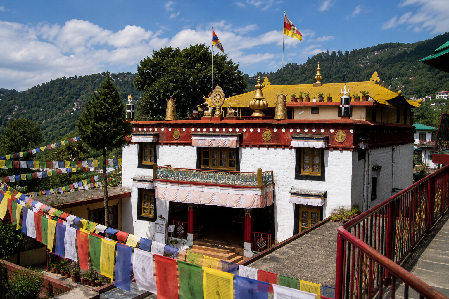 Dalai Lama Temple McLeodganj with Tibetan prayer flags and surrounding Himalayan hills
