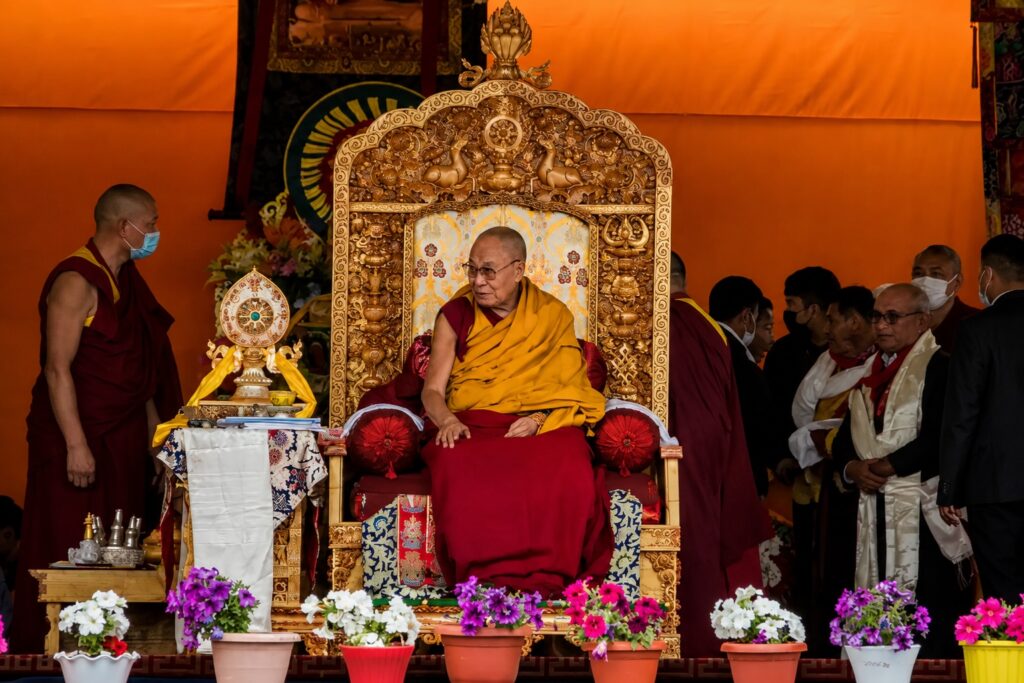 Dalai Lama Temple McLeodganj public teaching with His Holiness seated on an ornate ceremonial throne