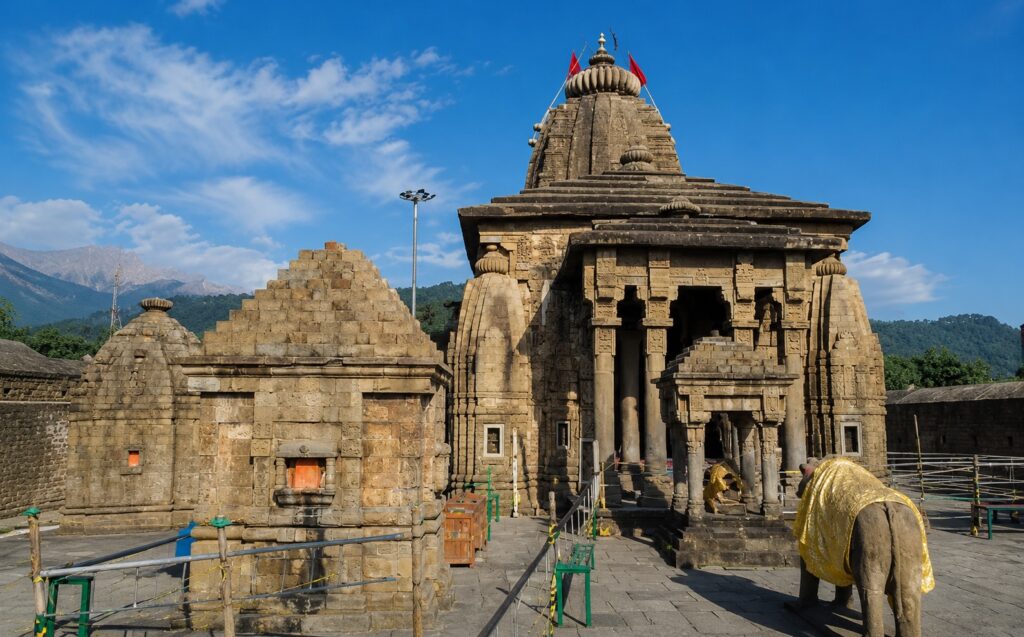 Ancient Baijnath Temple near Bir on a sunny day, showcasing traditional stone architecture and one of the most cultural things to do in Bir.