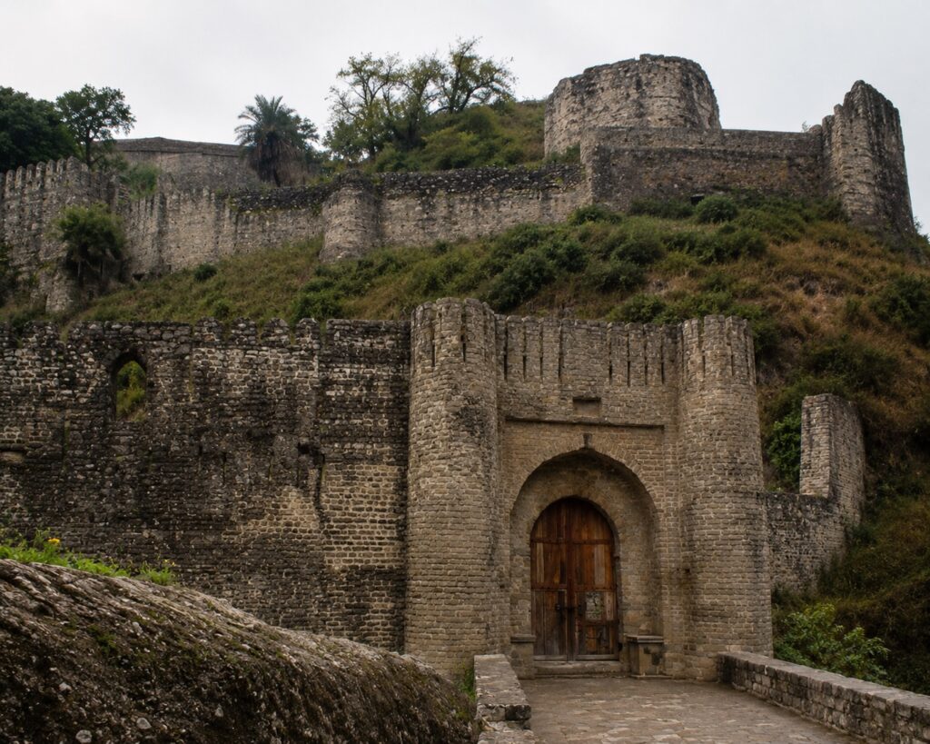 Kangra Fort main entrance gate and stone walls in Himachal Pradesh